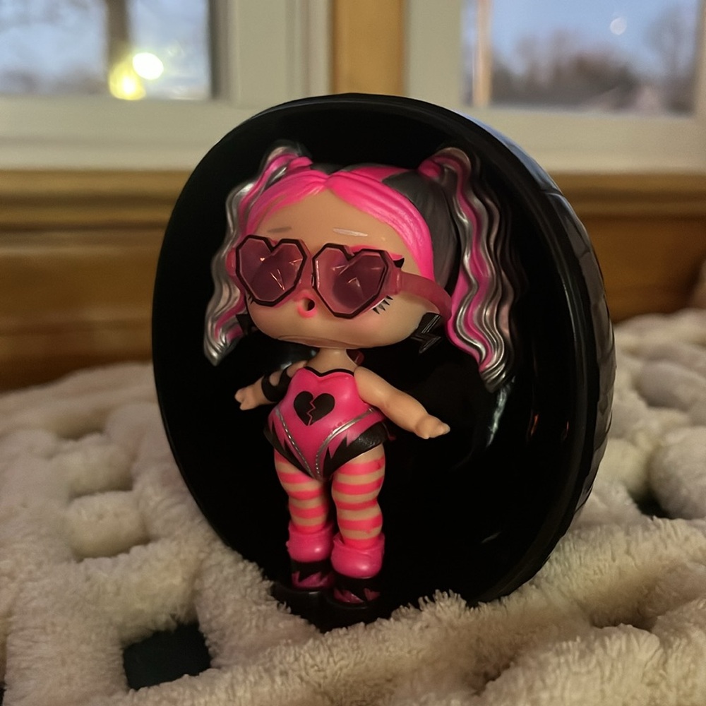 one L.O.L doll with ball